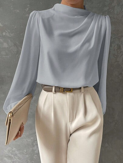 Elegant women's long sleeve blouse featuring bishop sleeves & a draped neckline. Perfect for sophisticated work & evening.