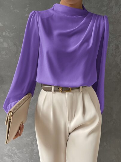 Women's elegant bishop sleeve blouse with draped neckline. Sophisticated long sleeve top for any occasion.