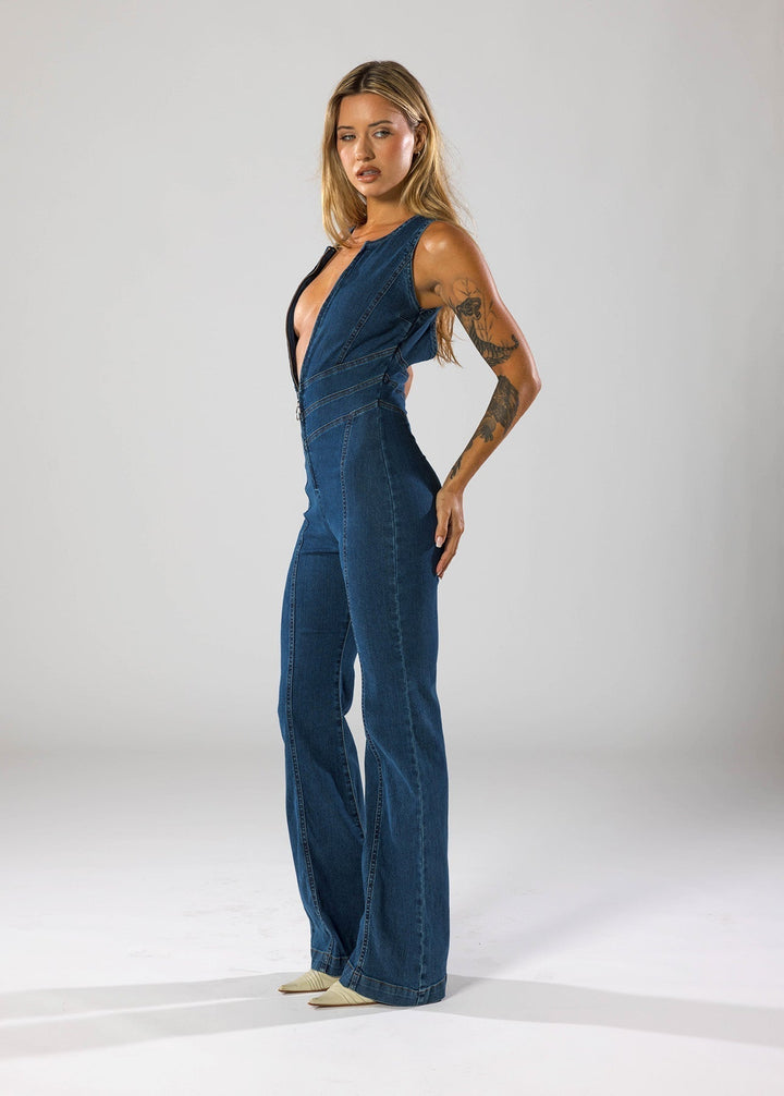 Modern women's evening jumpsuit with a distinctive heart plunge neckline, a true fashion statement.