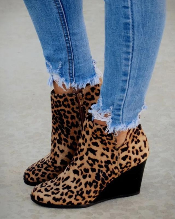 Elevated women's platform wedge ankle boots, offering stylish height and superior comfort for daily wear.