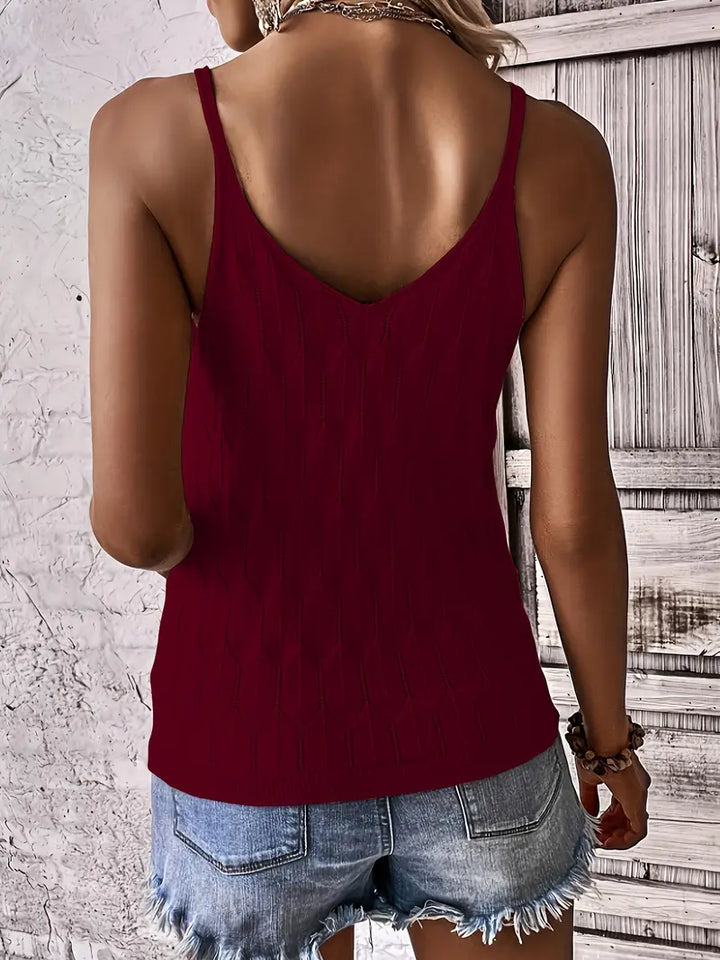 Chic women's V-neck sleeveless top, perfect for a layered or standalone summer look.