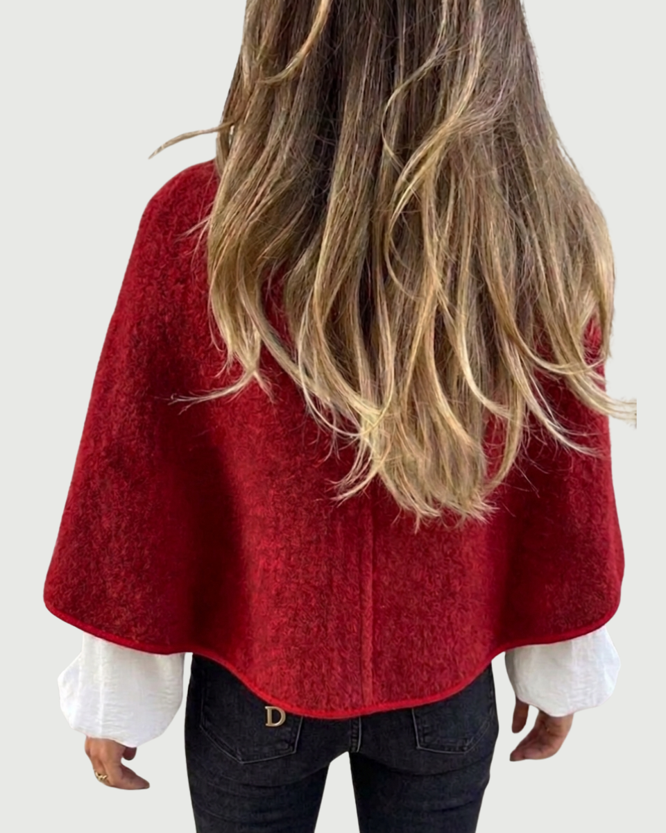 Women's elegant cropped round neck jacket, a versatile knit outerwear piece for sophisticated layering.