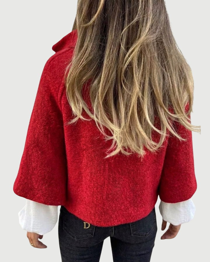 Versatile women's cropped round neck jacket, an elegant layering piece for both casual and sophisticated outfits.