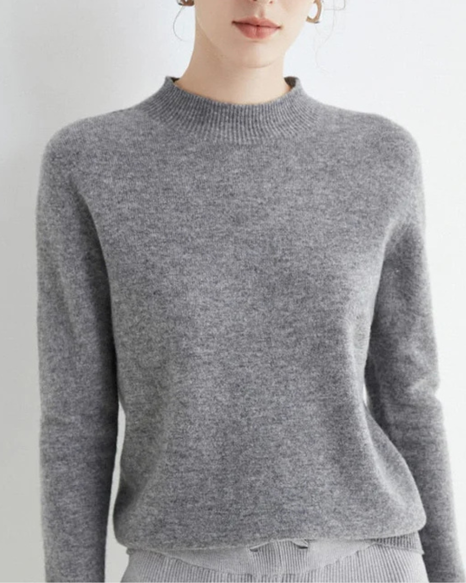 Comfortable knit mock neck sweater for women, perfect layering piece for cozy winter outfits.