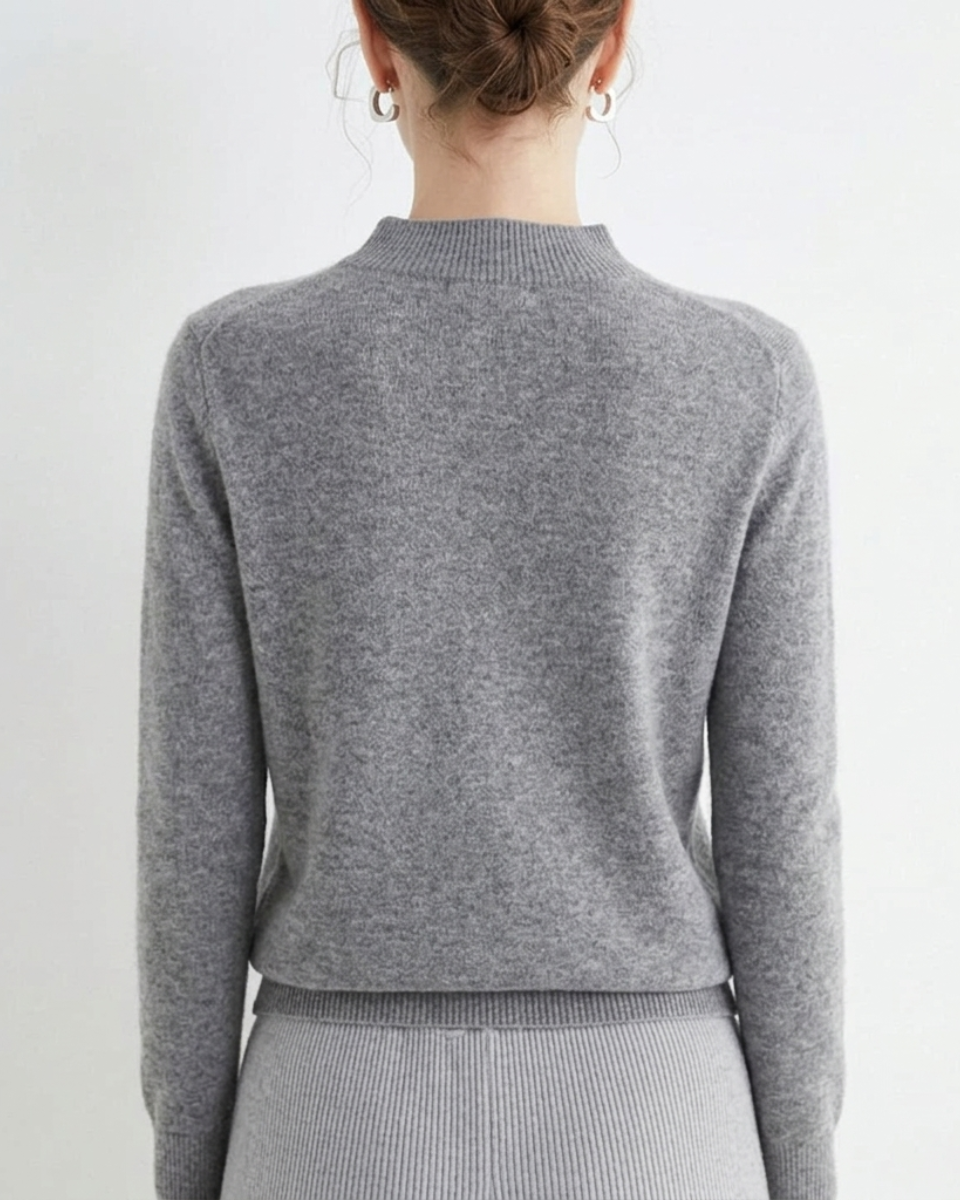 Women's long sleeve mock neck pullover, an elegant sweater for effortless style and comfort.