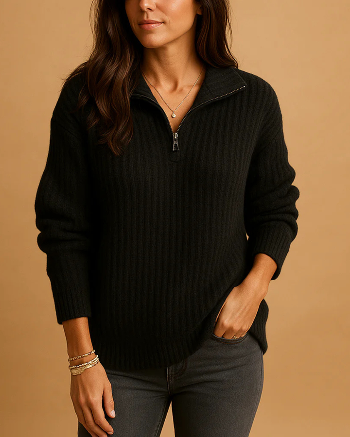 Woman enjoying comfortable movement in a long-sleeve half-zip structured sweater, ideal for everyday versatility.