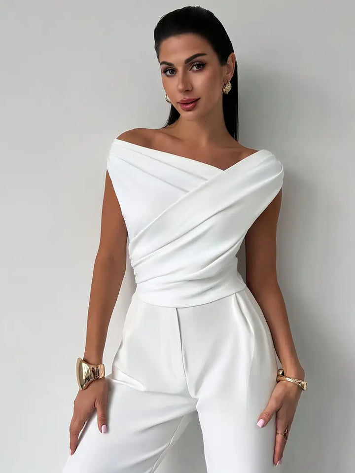 Elegant sleeveless top for women, featuring a flattering overlap neck design.