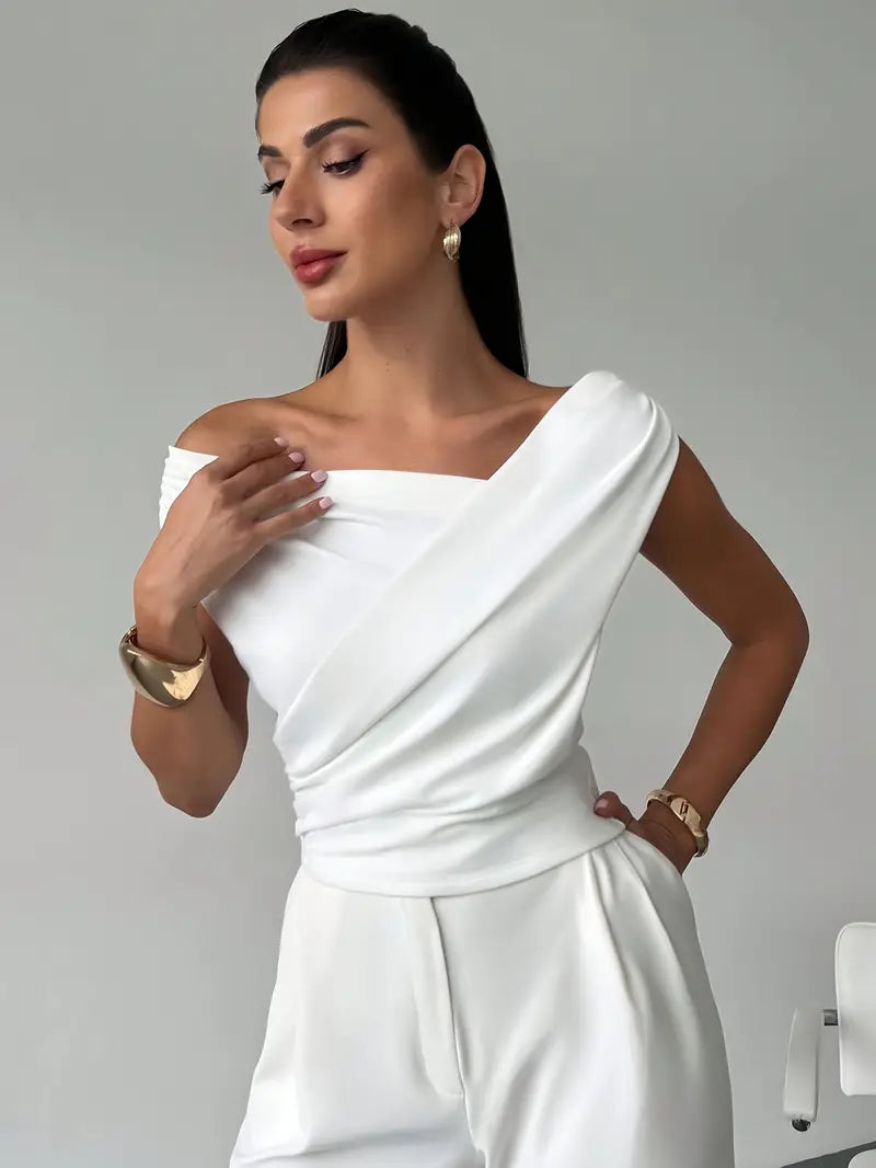 Versatile elegant sleeveless blouse, women's office wear & casual chic top.
