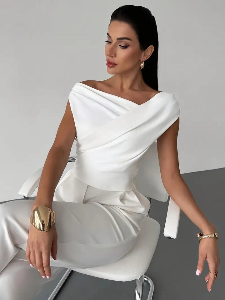 Chic women's overlap neck blouse, a stylish sleeveless top for any occasion.