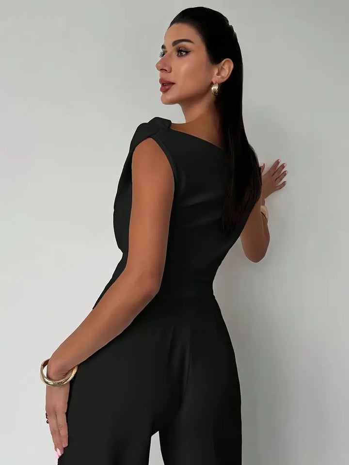 Modern women's sleeveless top, elegant overlap neck, suitable for office & casual wear.