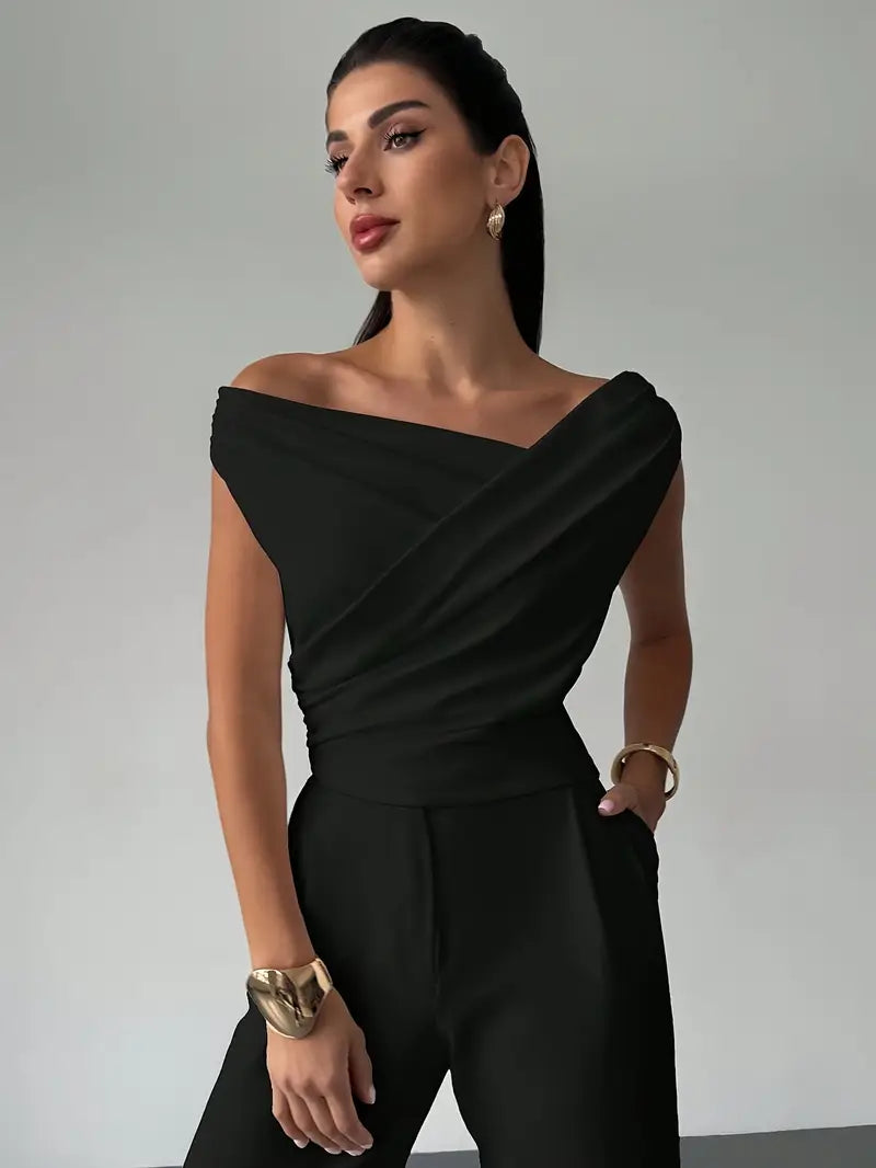 Fashionable women's sleeveless blouse, elegant overlap neck design for modern style.