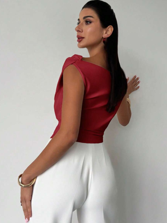 Key wardrobe piece: women's elegant overlap neck sleeveless blouse, versatile fashion.