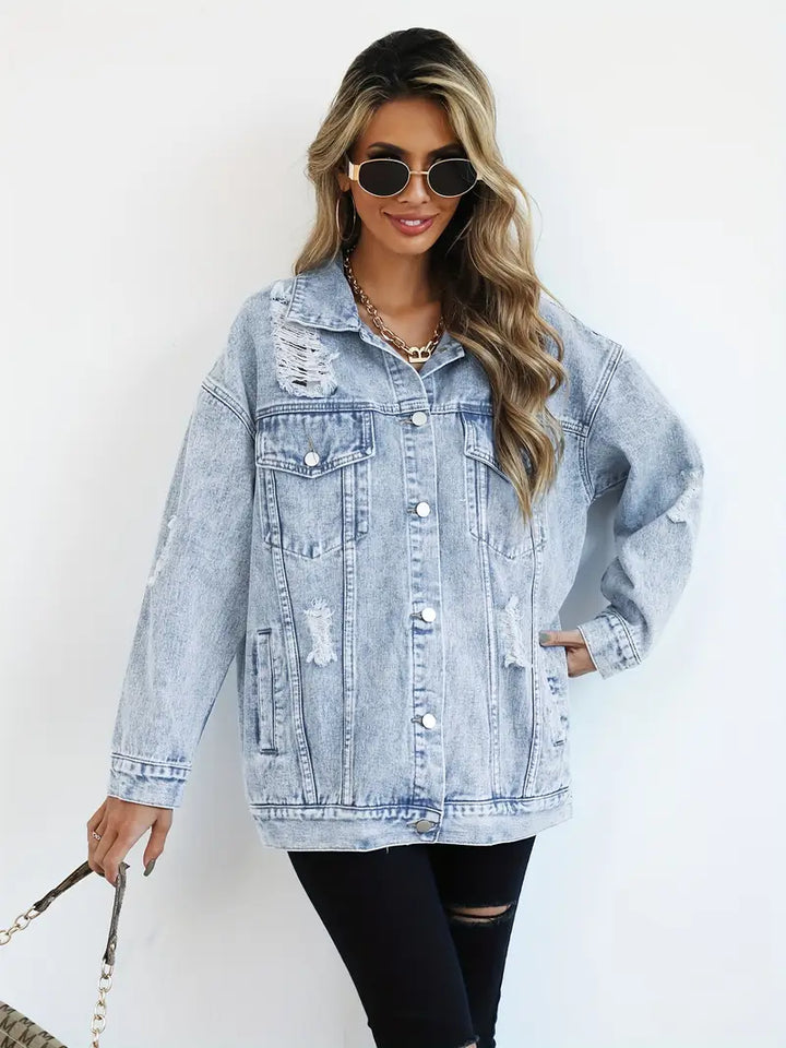 Stylish women's distressed light blue jacket, ideal for layering. Effortless, comfortable casual outerwear for any season.