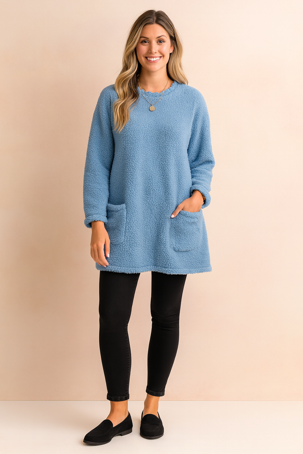 Cozy women's oversized knit sweater with long sleeves. Relaxed fit pullover, great for comfortable winter layering and casual style.