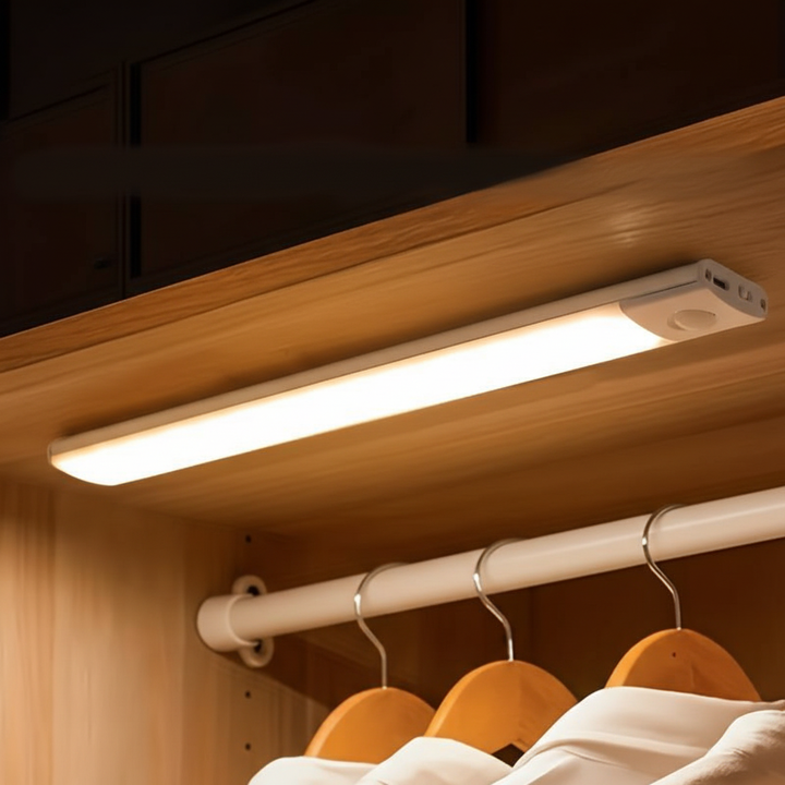 Rechargeable LED strip light with motion sensor for illuminating dark closets and cabinets.