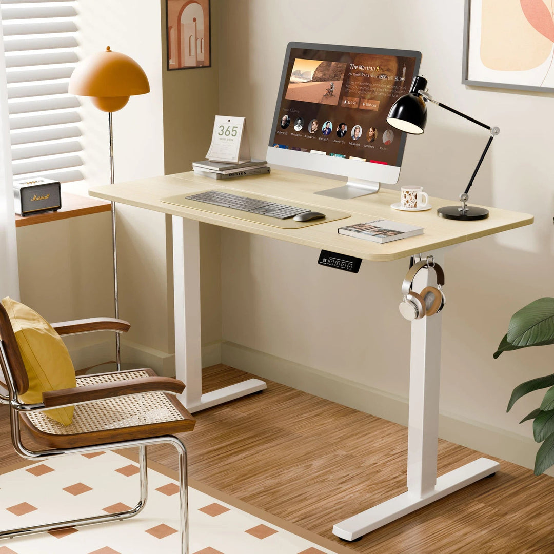 Modern adjustable standing desk with electric lift. Ideal computer table for an ergonomic sit-stand office.