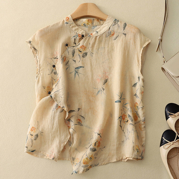 Women's floral sleeveless summer top featuring a mandarin collar. Relaxed fit for casual, feminine style.