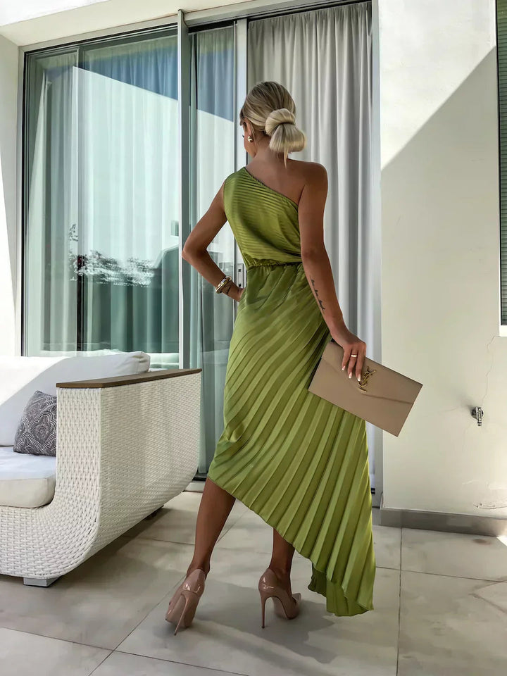 Flowing pleated midi dress, one-shoulder design for women's special occasion or cocktail party.
