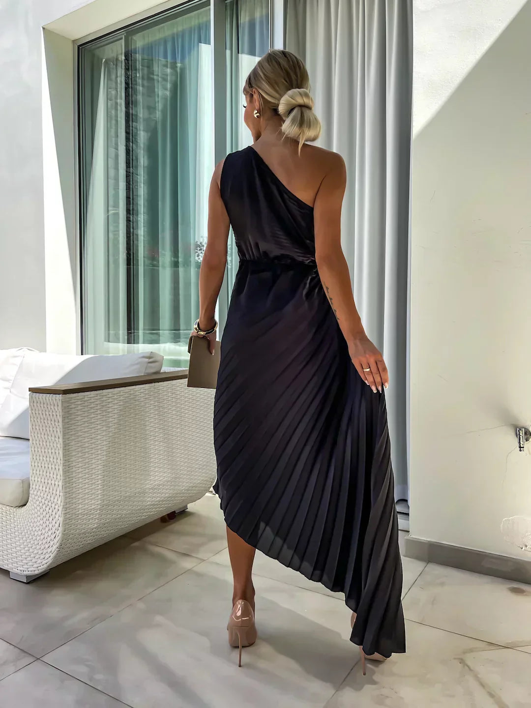 Elegant pleated one-shoulder midi dress. Ideal women's party dress or formal evening wear.