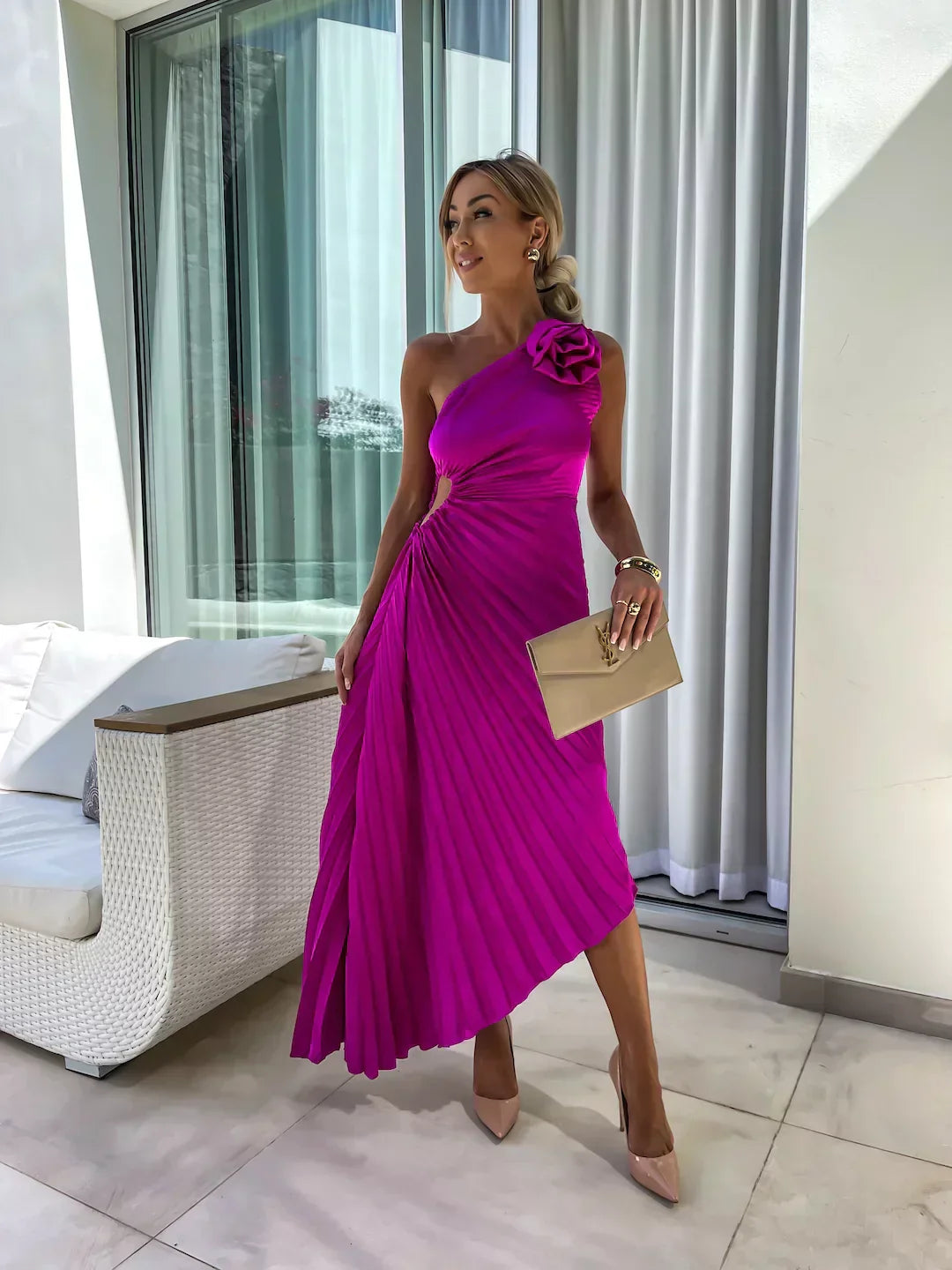 Women's flowing one-shoulder pleated midi dress, perfect for elegant special occasion wear.
