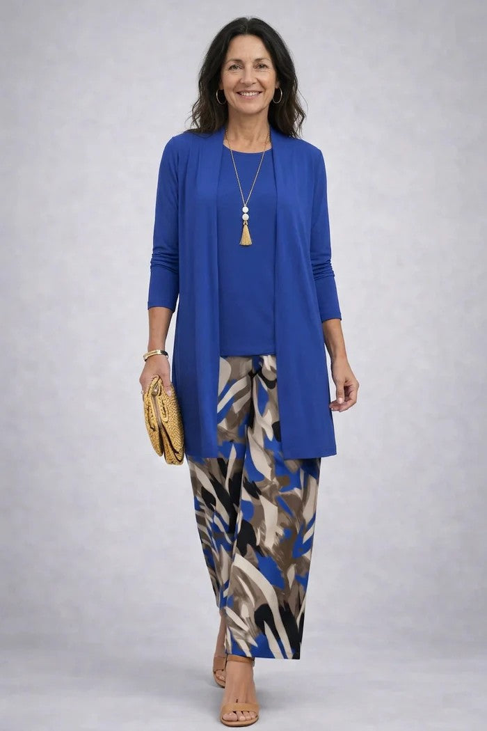 Stylish women's three-piece set with a vibrant print, featuring a cardigan, sleeveless top, and matching wide-leg pants.