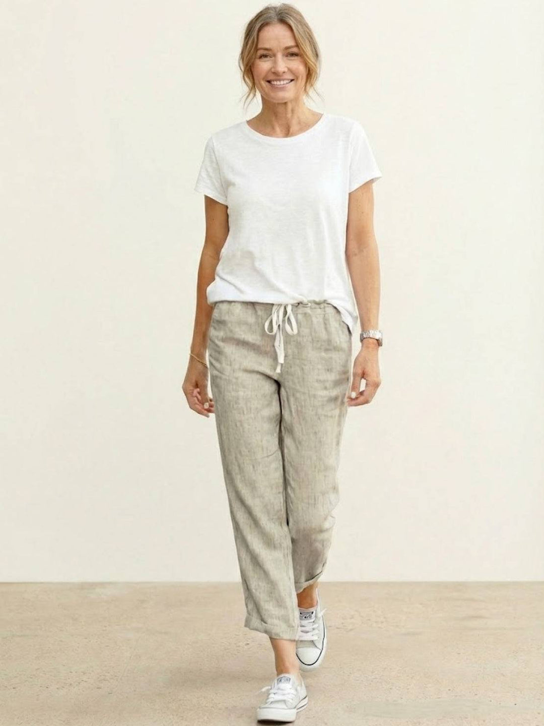 Versatile women's casual wide leg pants with an adjustable drawstring waist for effortless style.