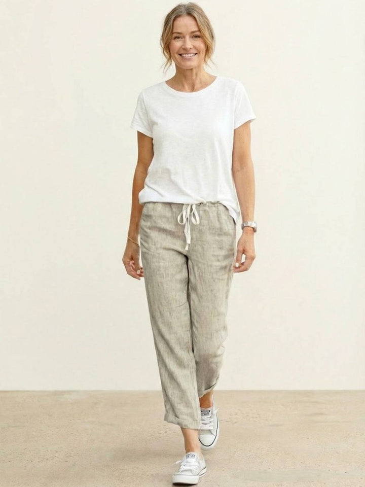 Versatile women's casual wide leg pants with an adjustable drawstring waist for effortless style.