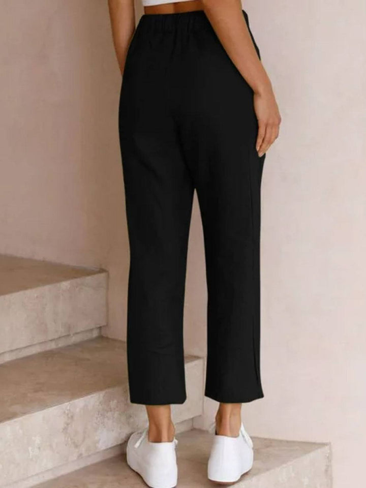 Effortless style: women's relaxed fit wide leg casual pants with a practical, comfortable drawstring.