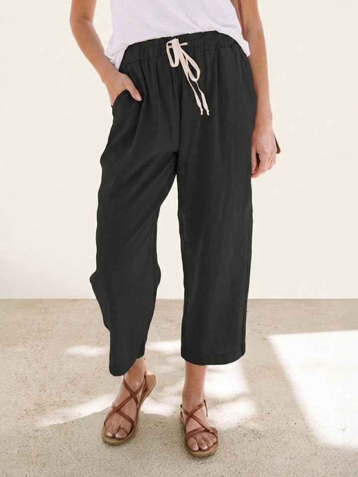 Close-up of the fabric texture and drawstring on women's relaxed fit wide leg casual pants.