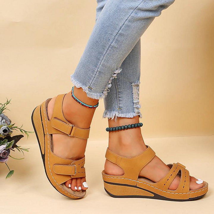 Stylish women's summer sandals with orthopedic design. Offers arch support for casual comfort & pain relief.