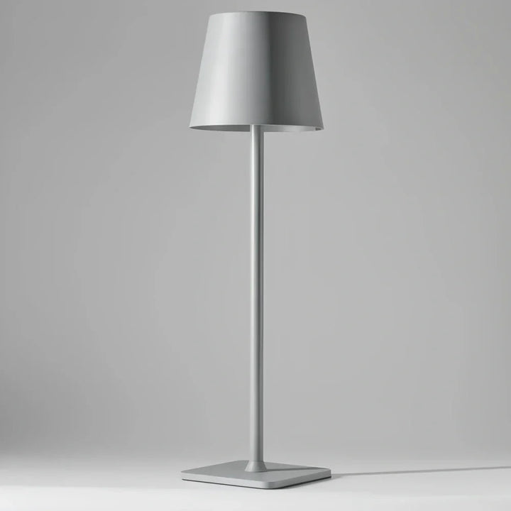 Modern dimmable LED table lamp. Rechargeable, portable for indoor/outdoor ambiance lighting.