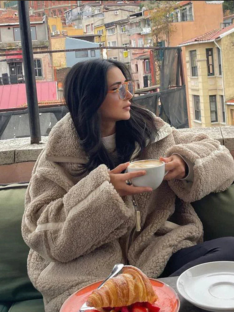Soft plush oversized jacket for women, ideal for warm fall outerwear and casual winter fashion.