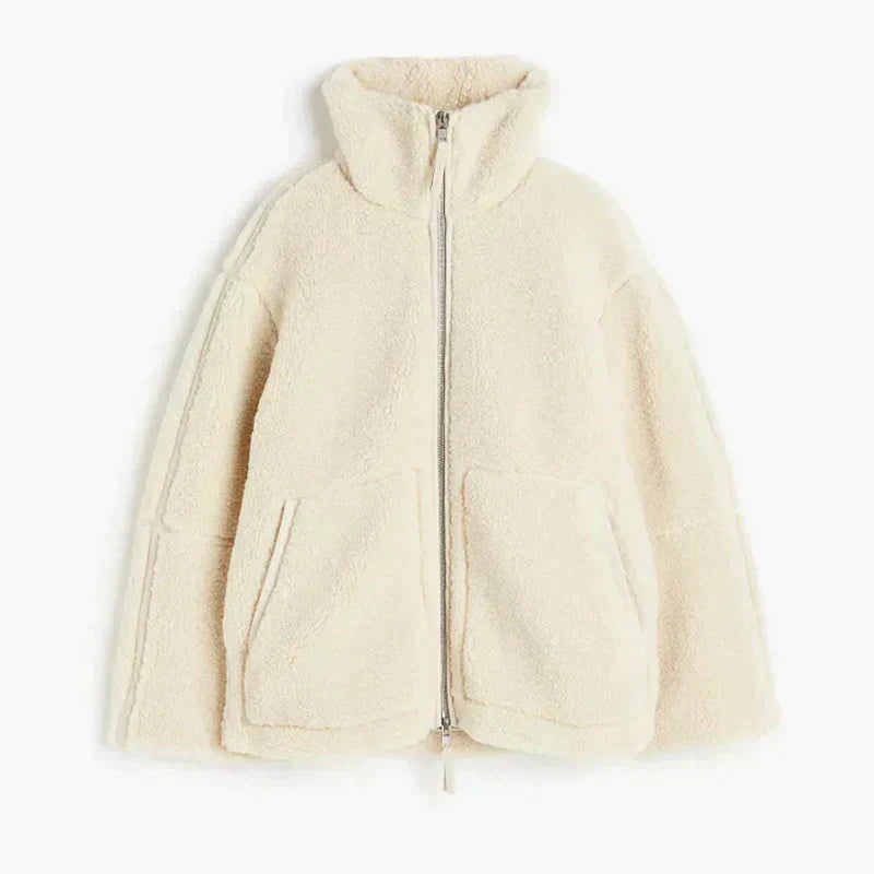 Elegant women's plush oversized jacket, designed for cozy fall evenings and stylish layering options.