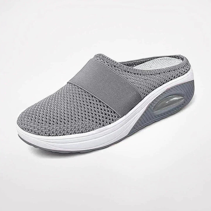 Practical women's home shoes. Lightweight, easy clean, & breathable casual clogs with foot support for daily use.