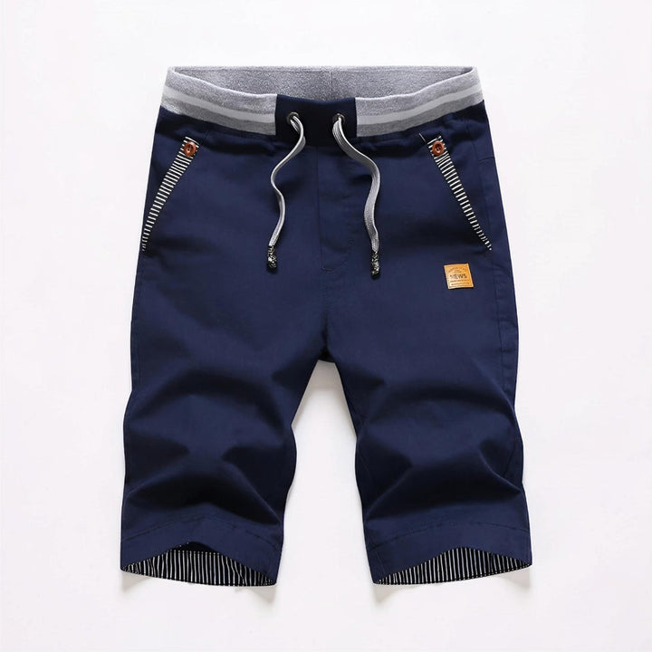 Comfy drawstring men's shorts. Practical casual wear, great for summer adventures and everyday style.