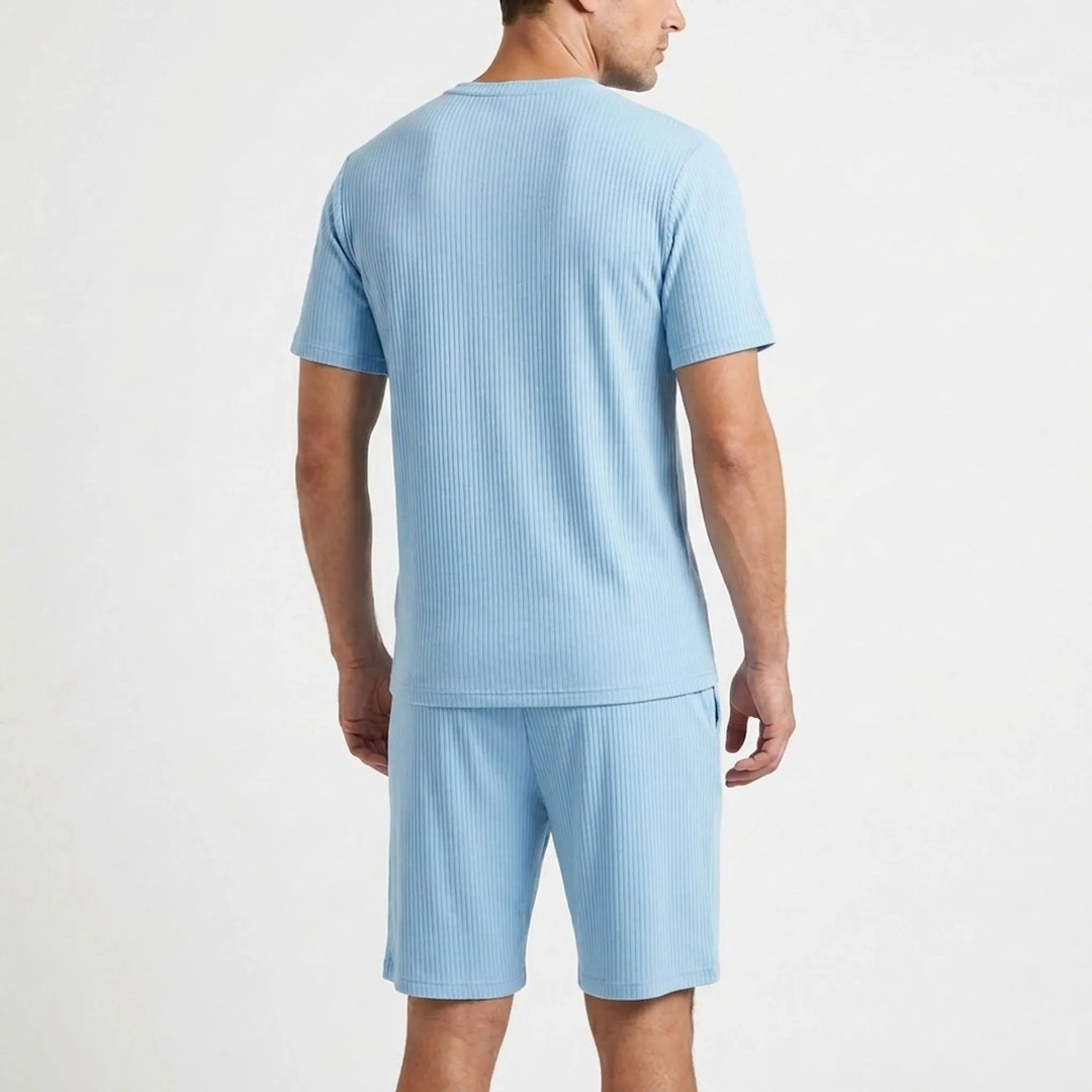 Relaxed fit men's two-piece ribbed pyjama set, short sleeve, perfect loungewear for summer nights.