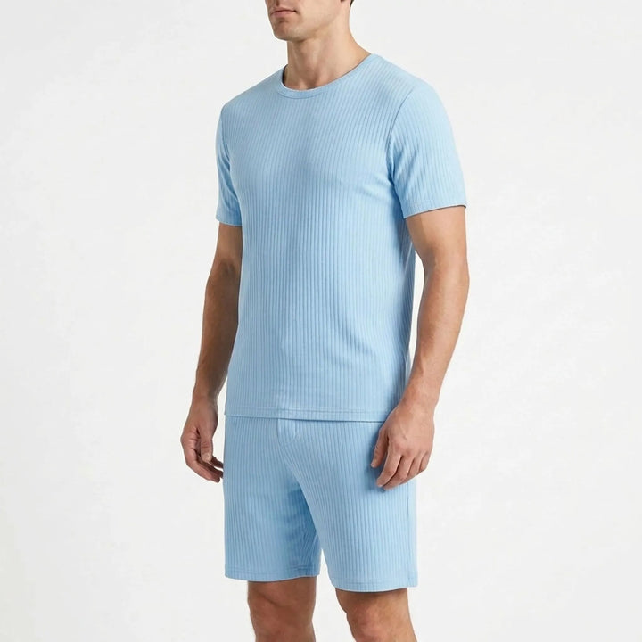 Comfortable men's lightweight ribbed sleepwear set, short sleeve pajamas for warm weather relaxation.