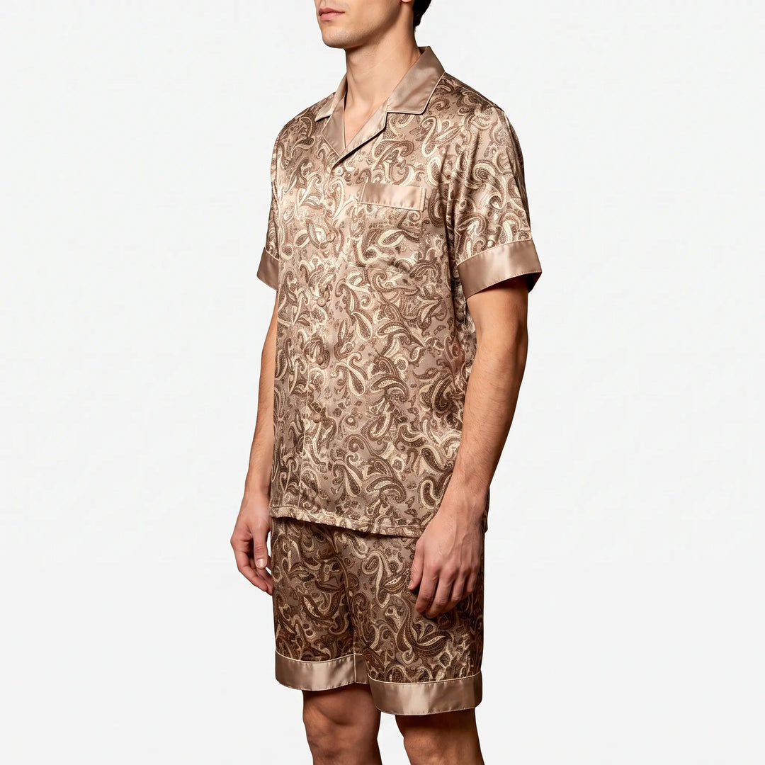 Casual men's summer nightwear: a relaxed fit patterned pajama set with short sleeves & matching shorts.