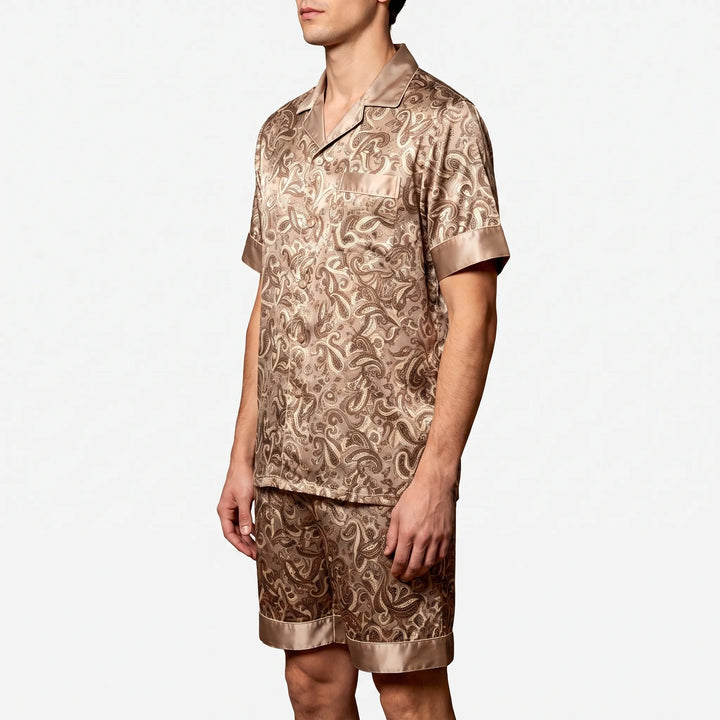 Casual men's summer nightwear: a relaxed fit patterned pajama set with short sleeves & matching shorts.