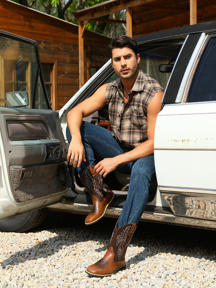Back view of durable men's western cowboy boots. Classic tall riding style, pull-on men's footwear.