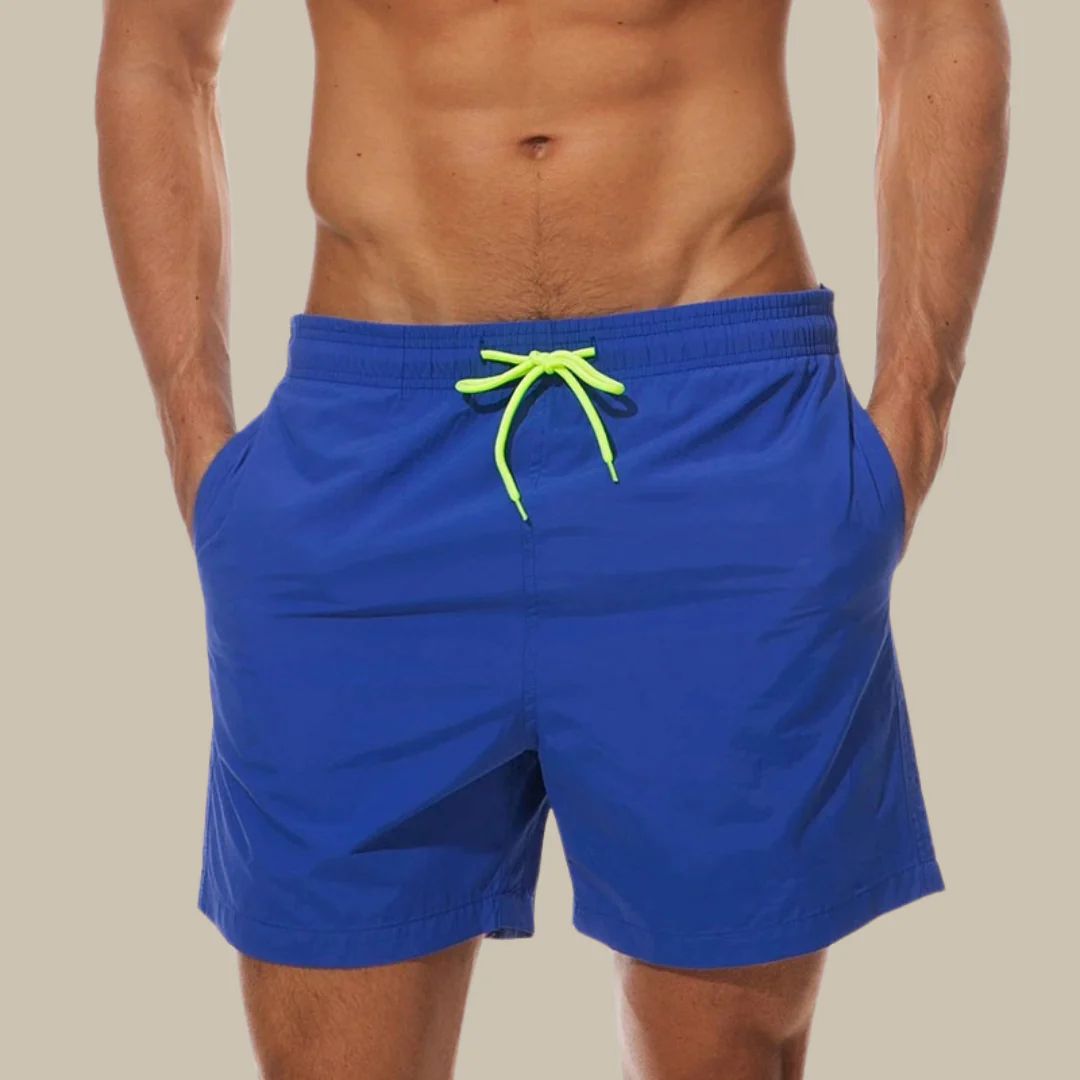 Comfortable men's quick-dry drawstring swim shorts for beach vacation, swimming, or active summer days. Stylish & practical.
