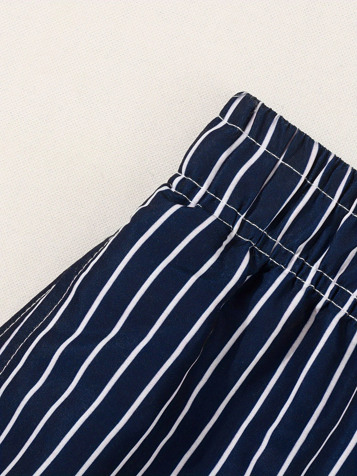 Quick-dry men's swim shorts with modern stripes. Essential summer fashion for beach and everyday wear.