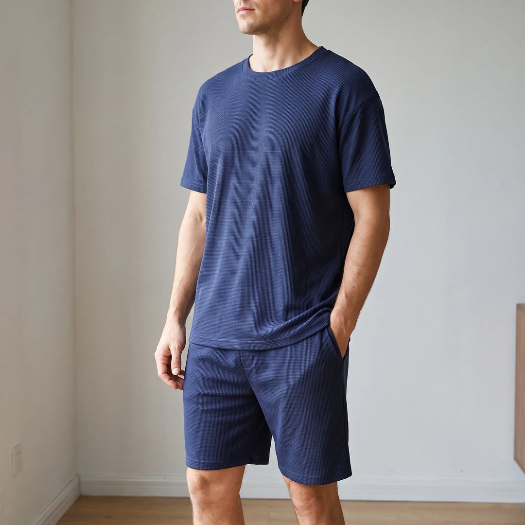 Men's breathable short pajama set for warm evenings, perfect for comfortable summer sleepwear.