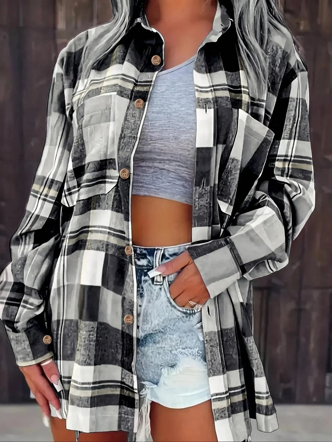 Versatile women's oversized plaid button-down shirt, perfect for spring layering & casual style.