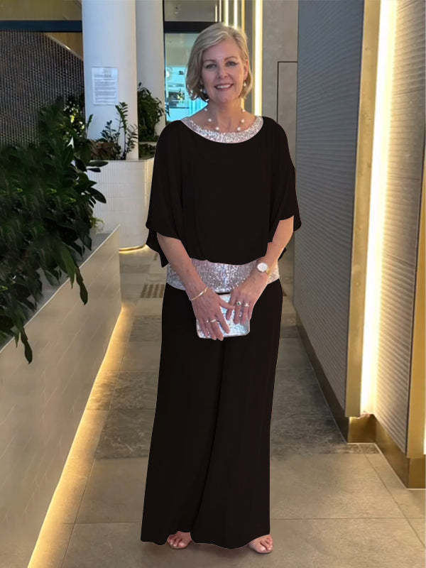 Dazzling women's sparkly two-piece evening set. Features an elegant top & wide-leg pants for a classy, sophisticated look.