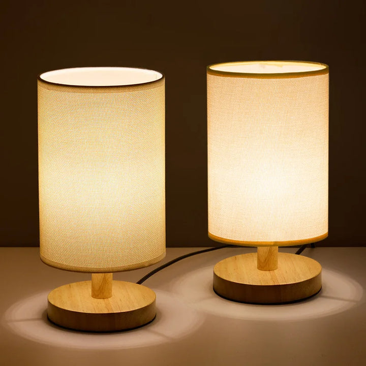 Fabric shade and wood base detail of the Dimmable Organic Glow Table Lamp, providing a warm, inviting light.