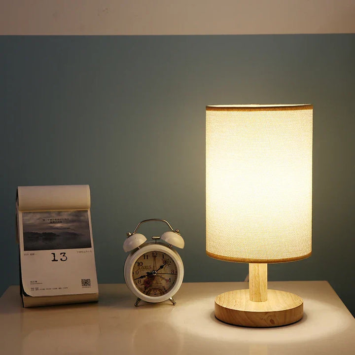 Versatile Dimmable LED Table Lamp with an organic glow, wood base, & USB power, perfect for bedside reading.