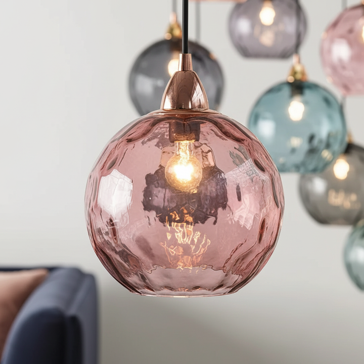 Clear glass GleamBall modern orb pendant light, elegant ambient ceiling lighting for dining rooms.