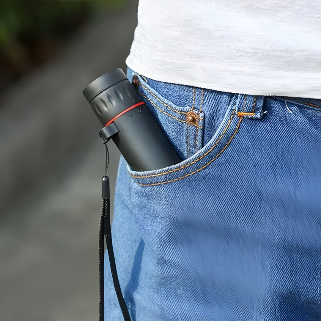Portable monocular scope for hiking & sightseeing; includes phone holder for stable smartphone viewing.