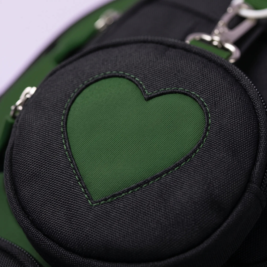 Organized student bag: geometric pattern, multiple compartments, and a handy detachable pouch.